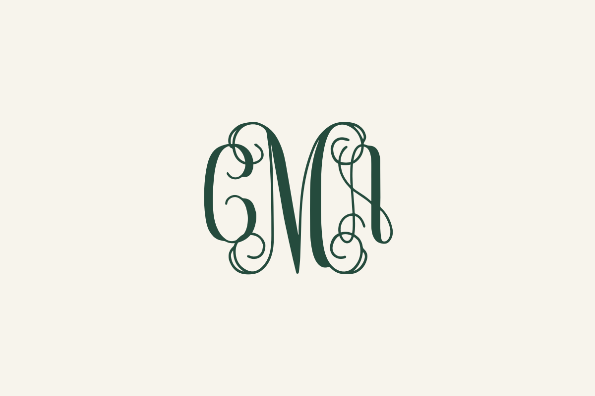 Decorative CMA initials in deep green with a larger last-name initial